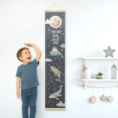 מד גובה לילדים – לוויתנים בחלל